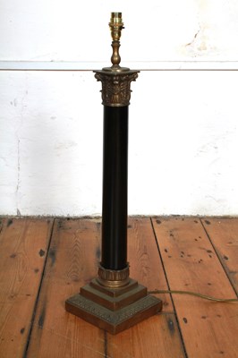 Lot 854 - A brass table lamp, in the form of a...