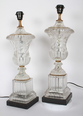 Lot 112 - A pair of glass table lamps, each in the form...