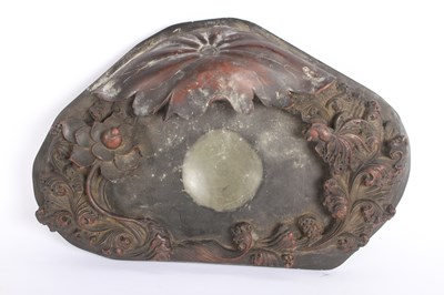 Lot 254 - A Chinese ink stone, carved with lotus flowers