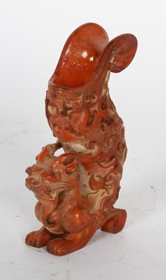 Lot 294 - A Chinese carved zoomorphic libation cup