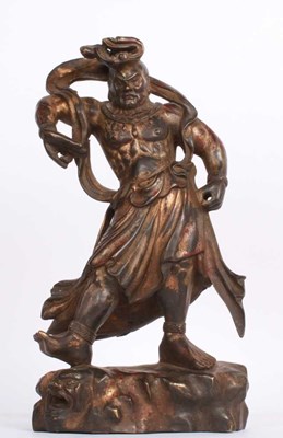 Lot 216 - A Chinese gilt bronze figure of a warrior,...