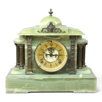 Lot 517 - A 19th century green onyx cased mantel clock,...