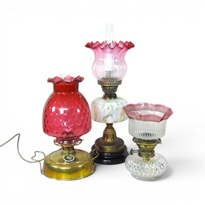 Lot 428 - An early 20th century brass oil lamp, with a...