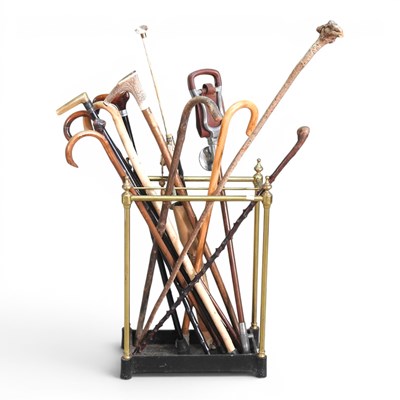 Lot 34 - A Victorian brass stickstand, 41cm wide,...
