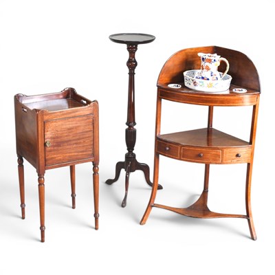 Lot 716 - A Regency mahogany corner washstand, with...