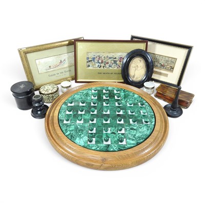 Lot 465 - An oak mounted green malachite solitaire, 36cm...