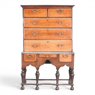 Lot 151 - An 18th century oak and featherbanded chest on...