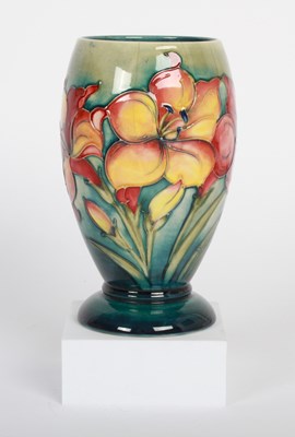 Lot 405 - A Moorcroft pottery vase, of tapered shape,...