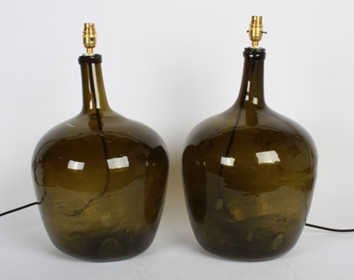 Lot 348 - A pair of glass carboys, converted to table lamps