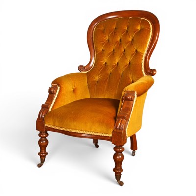 Lot 516 - A Victorian mahogany gold upholstered armchair