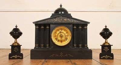 Lot 163 - A Victorian black slate mantel clock garniture,...
