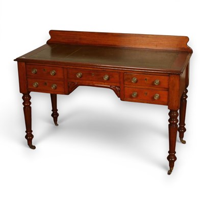 Lot 469 - A Victorian mahogany kneehole writing desk, on...