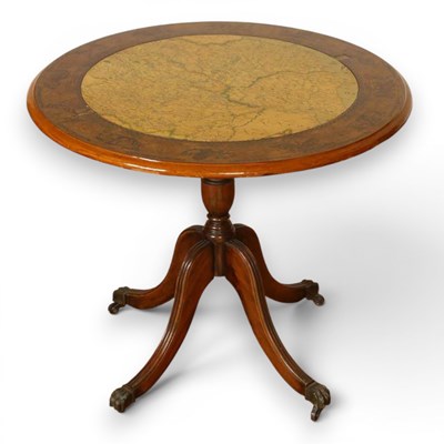 Lot 579 - A vintage Italian-style map bar table with the...