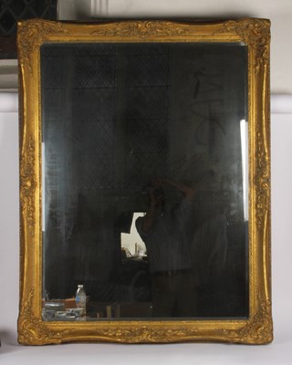 Lot 526 - A carved giltwood framed wall mirror, 111x142cm