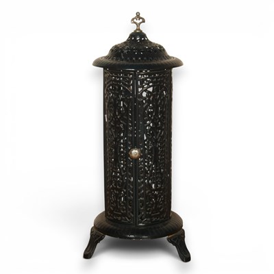 Lot 559 - A French cast iron stove with a dark turquoise...