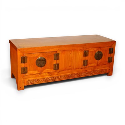 Lot 539 - A Chinese elm cabinet with carved panels and...
