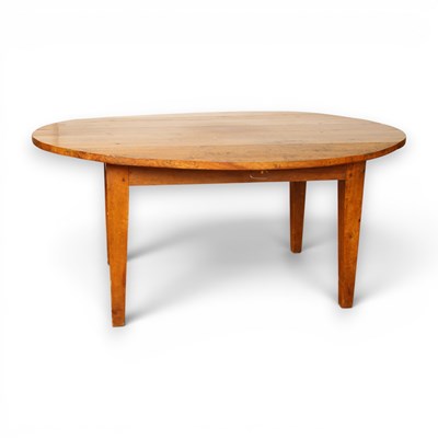Lot 515 - An antique fruitwood drop-leaf dining table on...