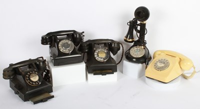 Lot 691 - A collection of various vintage rotary telephones