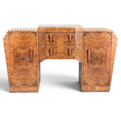 Lot 175 - An Art Deco burr walnut sideboard, of stepped...