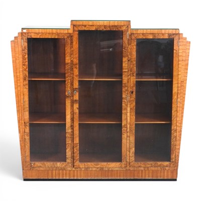 Lot 177 - An Art Deco walnut display cabinet, of stepped...