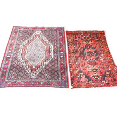 Lot 461 - A Persian rug, with a large central medallion,...