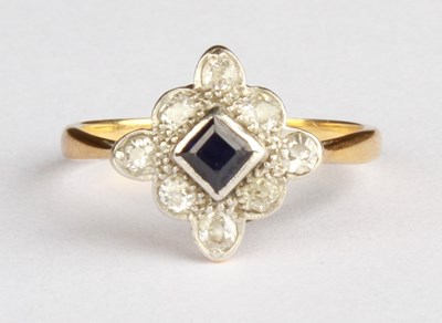 Lot 25 - An 18 carat yellow gold and platinum sapphire...