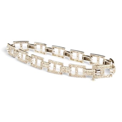 Lot 79 - A Tiffany style 9 carat white gold diamond set...