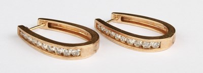 Lot 16 - A pair of 9 carat yellow gold graduated...