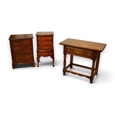 Lot 729 - Two reproduction chest of drawers and a side...