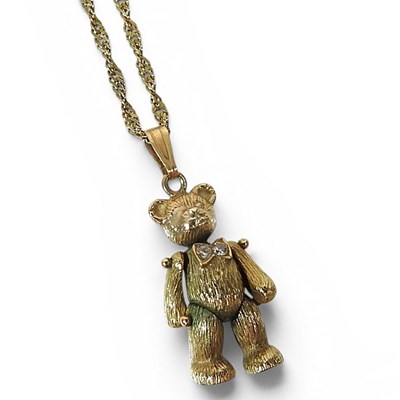 Lot 170 - A 9 carat gold articulated teddy bear pendant,...
