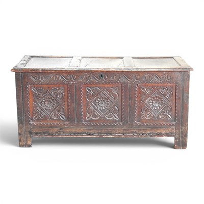Lot 436 - An 18th century carved oak coffer, of large...