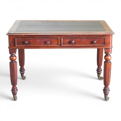 Lot 708 - A Victorian writing table, with an inset...