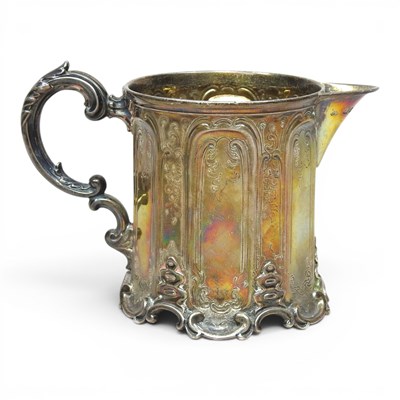Lot 58 - A Victorian silver cream jug, the later spout...