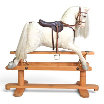 Lot 157 - A modern composition rocking horse, on a...