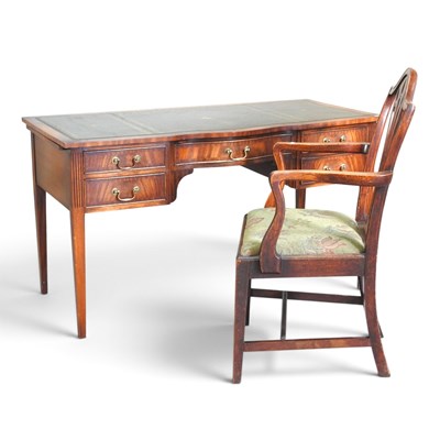 Lot 240 - A reproduction mahogany writing desk, 137cm...