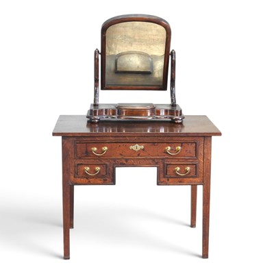 Lot 746 - An 18th century oak lowboy, containing three...