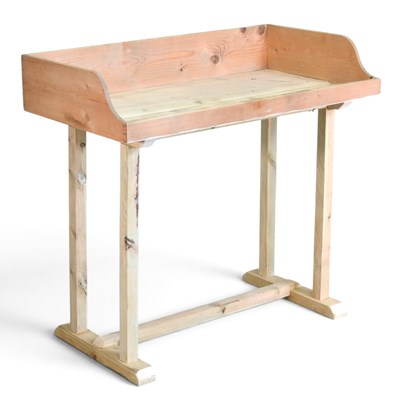 Lot 336 - A pine potting table, with a gallery back