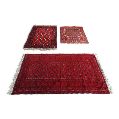 Lot 219 - A Bokhara rug, with rows of medallions, on a...