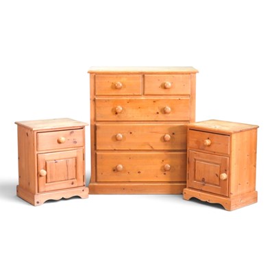 Lot 311 - A modern pine chest of drawers, together with...