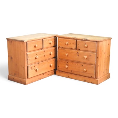 Lot 663 - A pair of modern pine chests of drawers, each...