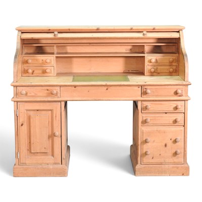 Lot 346 - A modern pine tambour top pedestal desk, on a...