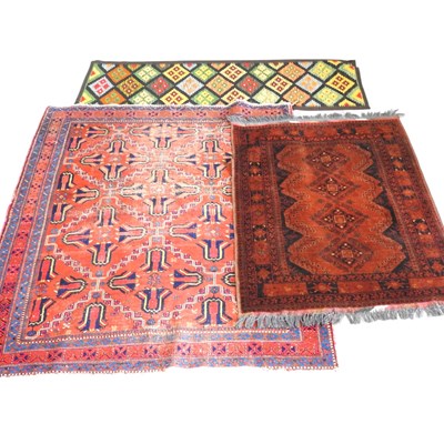 Lot 727 - A Turkish rug, with geometric designs, on a...