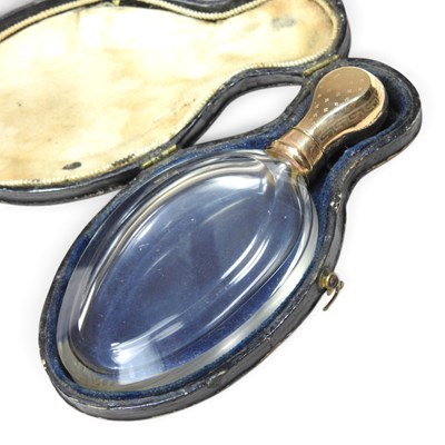 Lot 29 - An early 20th century glass scent bottle, with...
