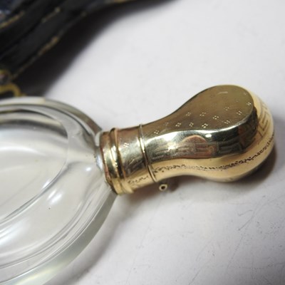Lot 29 - An early 20th century glass scent bottle, with...