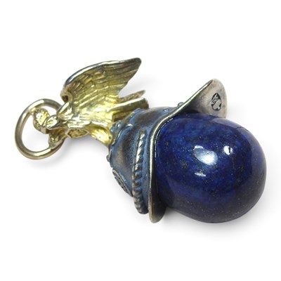 Lot 65 - A Russian style silver and lapis pendant, in...