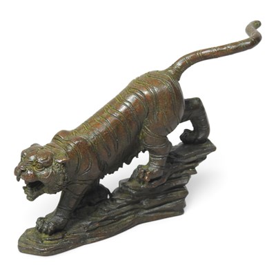 Lot 176 - A modern Chinese bronzed model of a tiger, on...