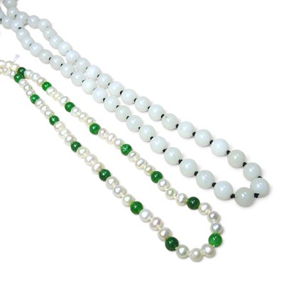 Lot 76 - A pearl and jade single strand necklace, with...