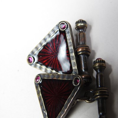 Lot 45 - A pair of Russian style white metal and red...