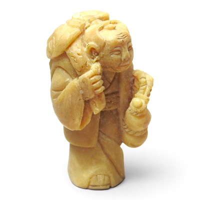 Lot 412 - A Japanese carved nut netsuke, in the form of...