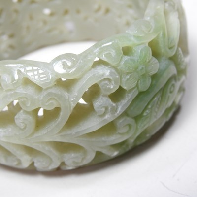 Lot 42 - A Chinese carved celadon jade coloured stone...